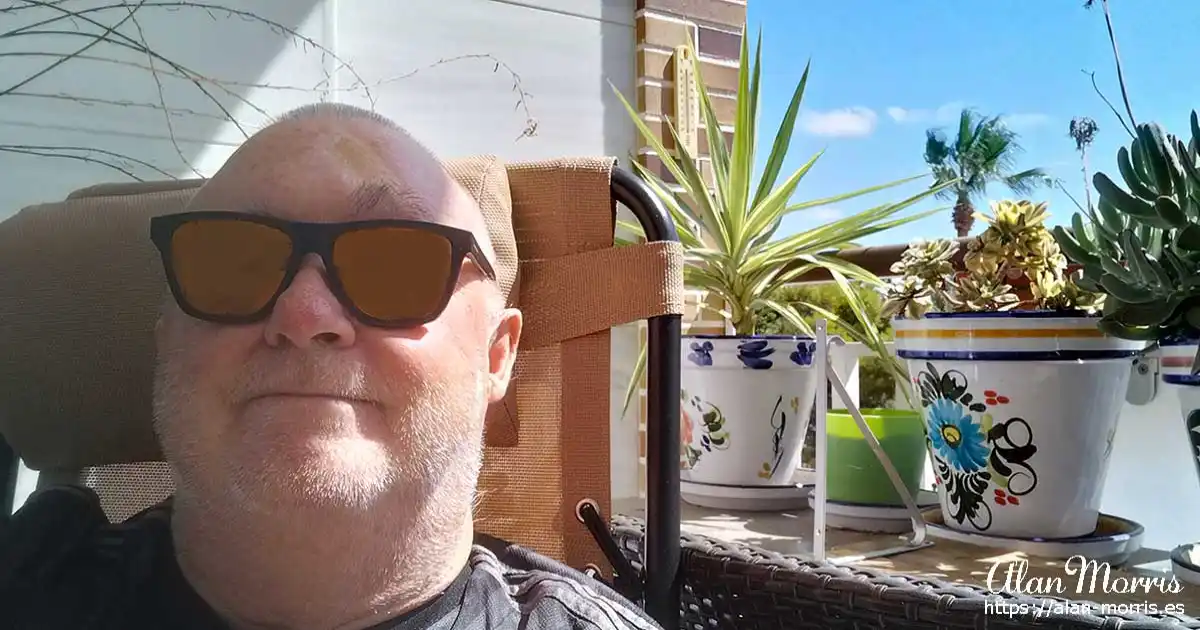 Alan Morris on his balcony at Plaza de Espejo.